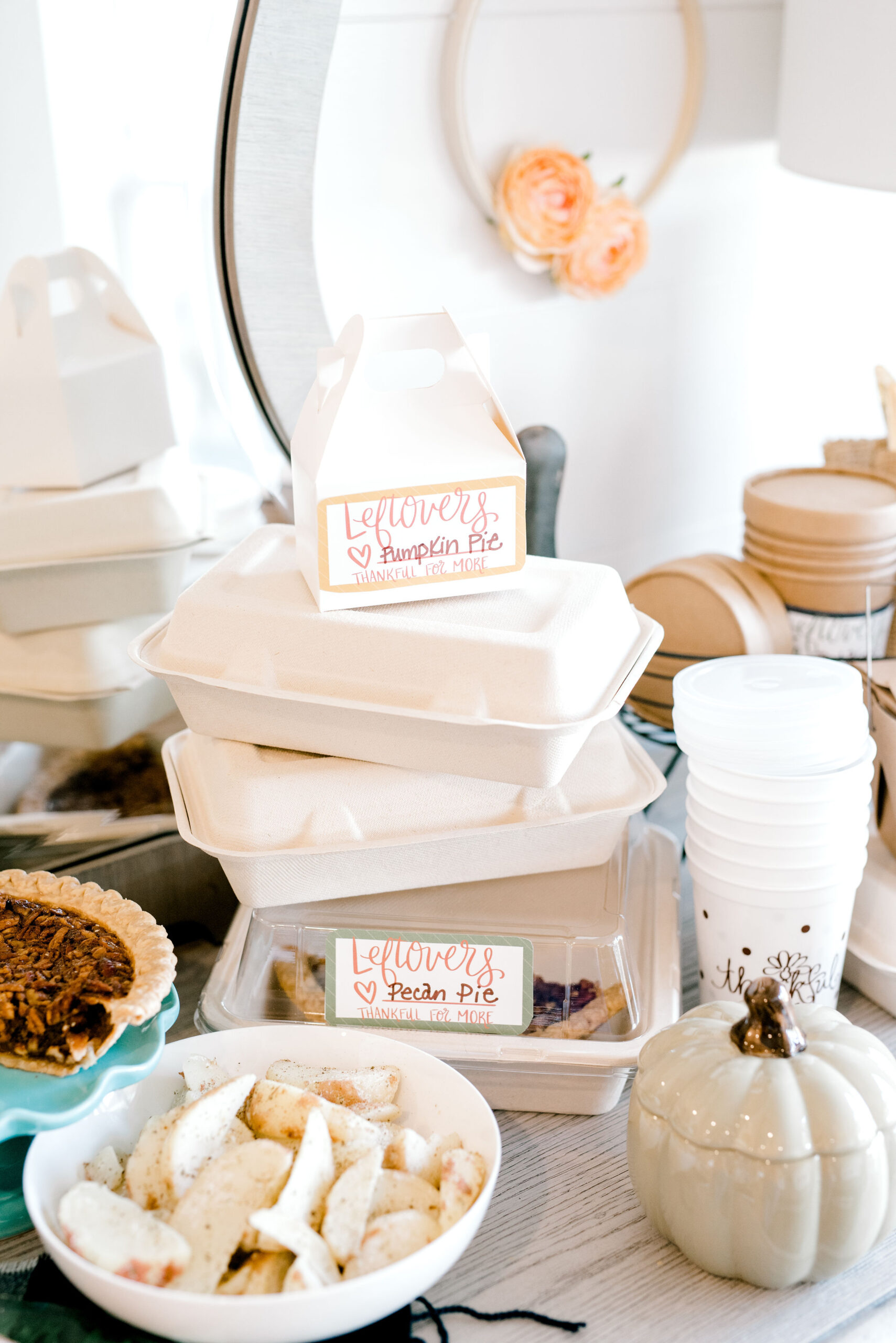 Leftovers station with to-go containers and labels.