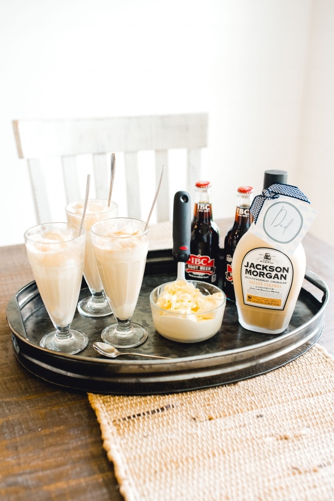 Whiskey cream, root beer, ice cream floats in tall glasses.