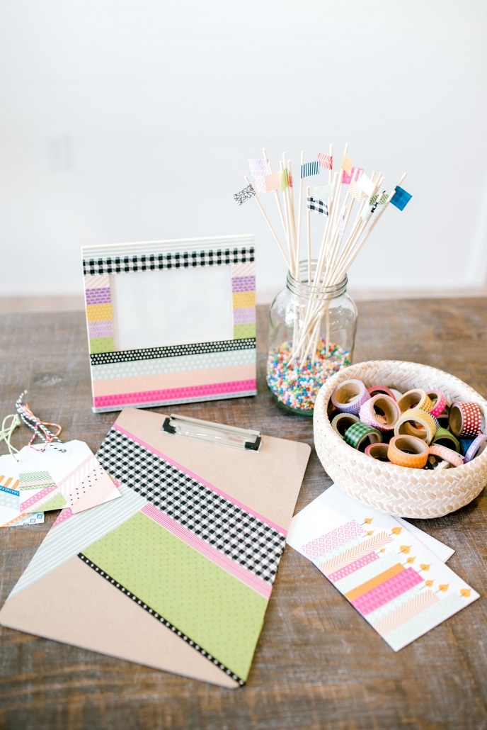 Washi tape decorated frame, clipboard, and skewers.